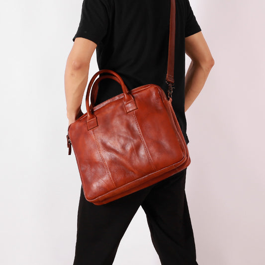 alt
Borsa ventiquattrore grande in pelle conciata al vegetale, borsa business con manico per laptop