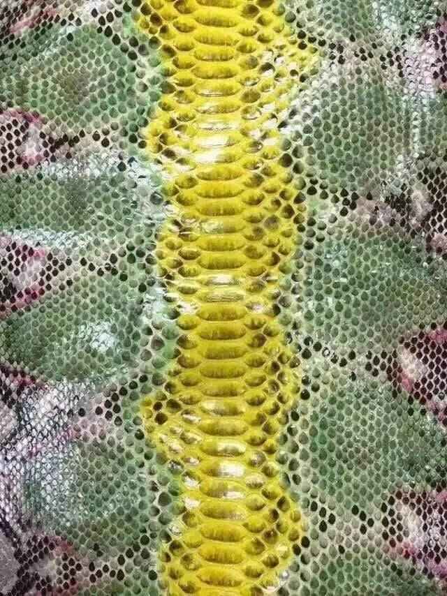 Close-up of python skin leather in vibrant colorway, showcasing textured pattern on a luxury Exotic Skin Leather Bag or accessory.