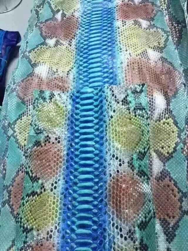 Python skin leather in a colorful pattern, featured on a crocodile handbag or belt from Exotic Skin Leather Bags by Rossieviren.