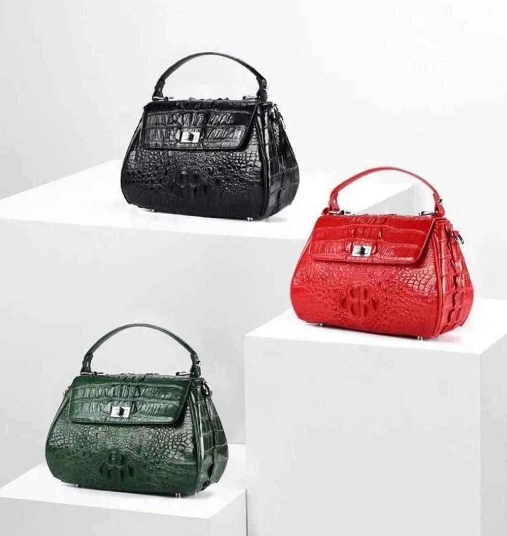 Borsa a tracolla da donna in pelle di coccodrillo piccola con chiusura a torsione e manico superiore